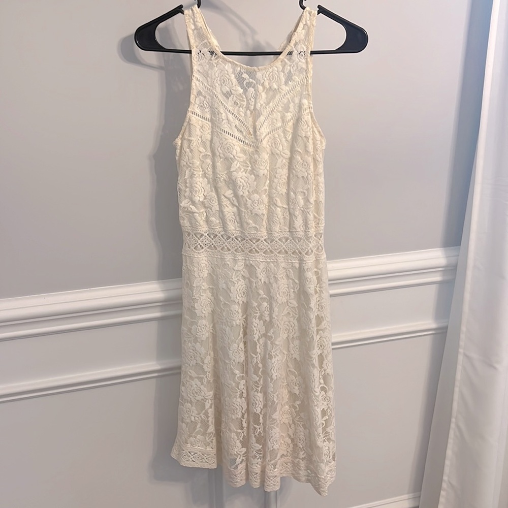 Dress size small. Worn twice. Off white